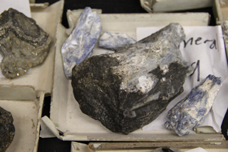 Boxes of rock and mineral hand samples.