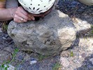 Student examining kimberlite rock.