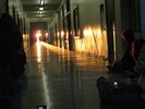 Photo of students observing the 'MIT Henge' effect in the hallway.