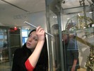 Photo of a student attempting to determine exactly where the historical telescope is pointing.