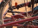 Side view photo of trike's rear wheels and supporting structure.