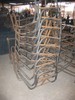 Photo of a stack of trike frames.