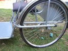 Photo of rear wheel and brake.