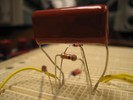 A bridge rectifier circuit with an additional capacitor.