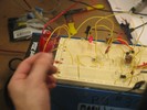 A student tests his circuit.