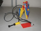 A standard Lego claw run by a pneumatic pump sensor.