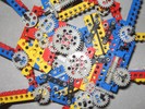 This robot resembles a Ferris wheel, with paddles and feet extending out at regular intervals to rotate the robot.