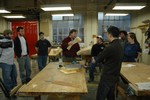 Instructor Reuben Smith shows the class a model profile sawn from a wood block.