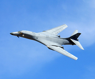 A B-1 Lancer bomber performs a fly-by.