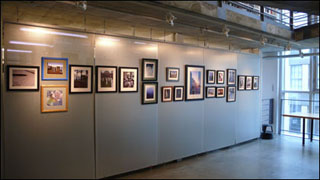 Student artwork on display in a gallery.