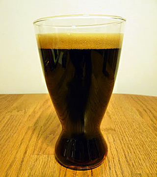 a photograph showing a glass of beer