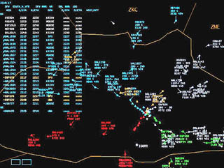 Screen shot of air traffic management software showing many colored regions representing planes.