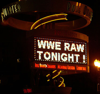 A neon sign announces WWE Raw.