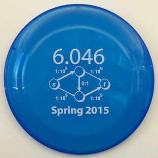 A picture of a blue frisbee with a four node graph printed on it.