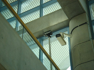 Photo of a wireless access on a concrete pillar.