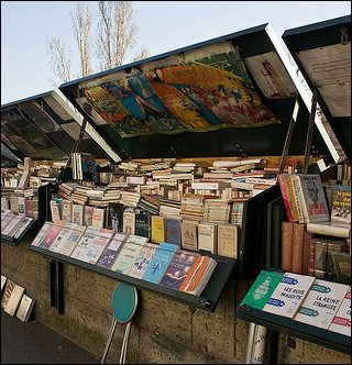 Books on display is two meter boxes along the river Seine in Paris.