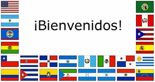 A collection of flags from Spanish-speaking countries with the greeting, &quot;Bienvenidos.&quot;