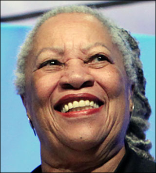 The photo shows a smiling Toni Morrison at the podium during her keynote address at the American Library Association General Opening Session in 2010.
