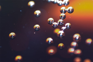 Macro photo of gas bubbles in cola.