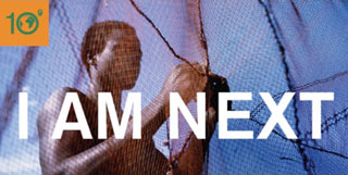 Photo of a man mending a fishing net, overlaid with the words 'I AM NEXT.'