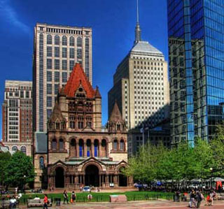 Photograph of Trinity Church and surrounding buildings in downtown Boston.