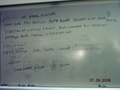 Whiteboard notes about observation of atoms in a gas.