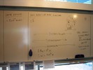 Notes on a whiteboard about cluster depth.
